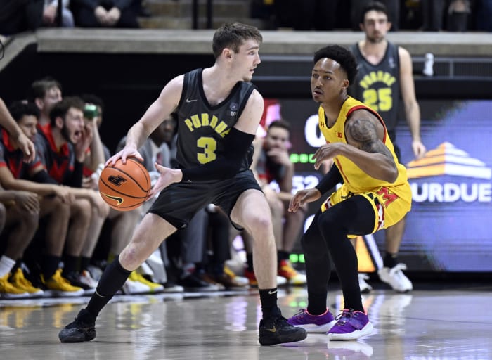 Jan 22, 2023; West Lafayette, Indiana, USA; Purdue Boilermakers guard Braden Smith (3) looks to get a ball past Maryland Terrapins guard Jahmir Young (1) during the first half at Mackey Arena.